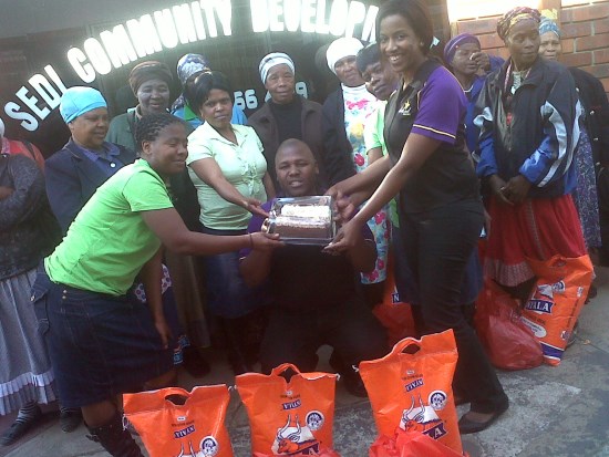 Hollywoodbets Estcourt presented cake and food items to Sedi Community Development as part of Mandela's "67 Minutes of Service"