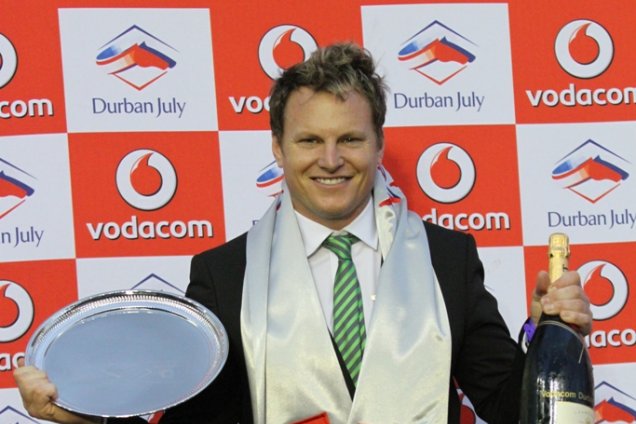Horse racing trainer Justin Snaith celebrating his victory in the Vodacom Durban July
