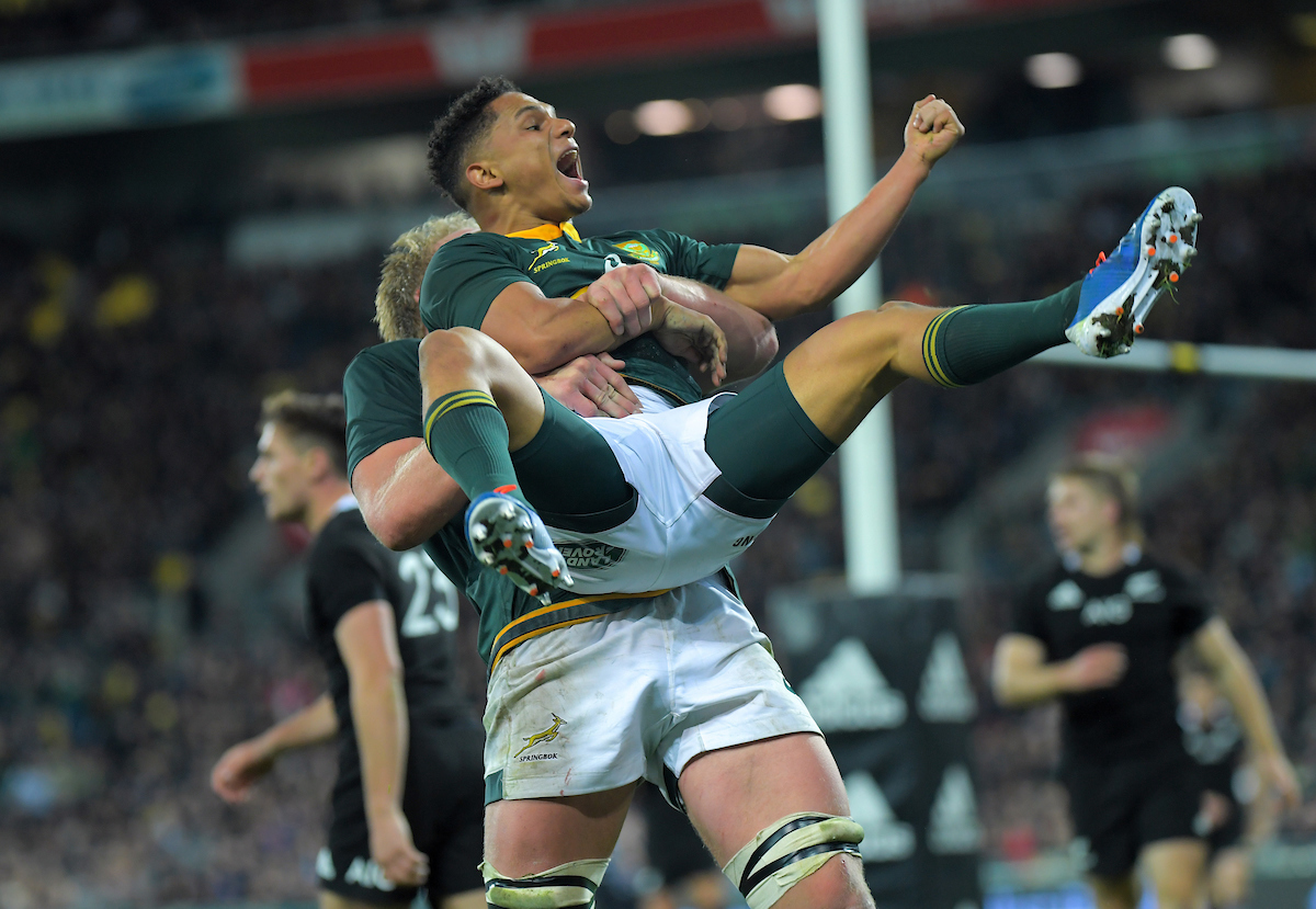 South Africa's Pieter-Steph du Toit congratulates South Africa's Herschel Jantjies on his last minute try during the Rugby Championship 