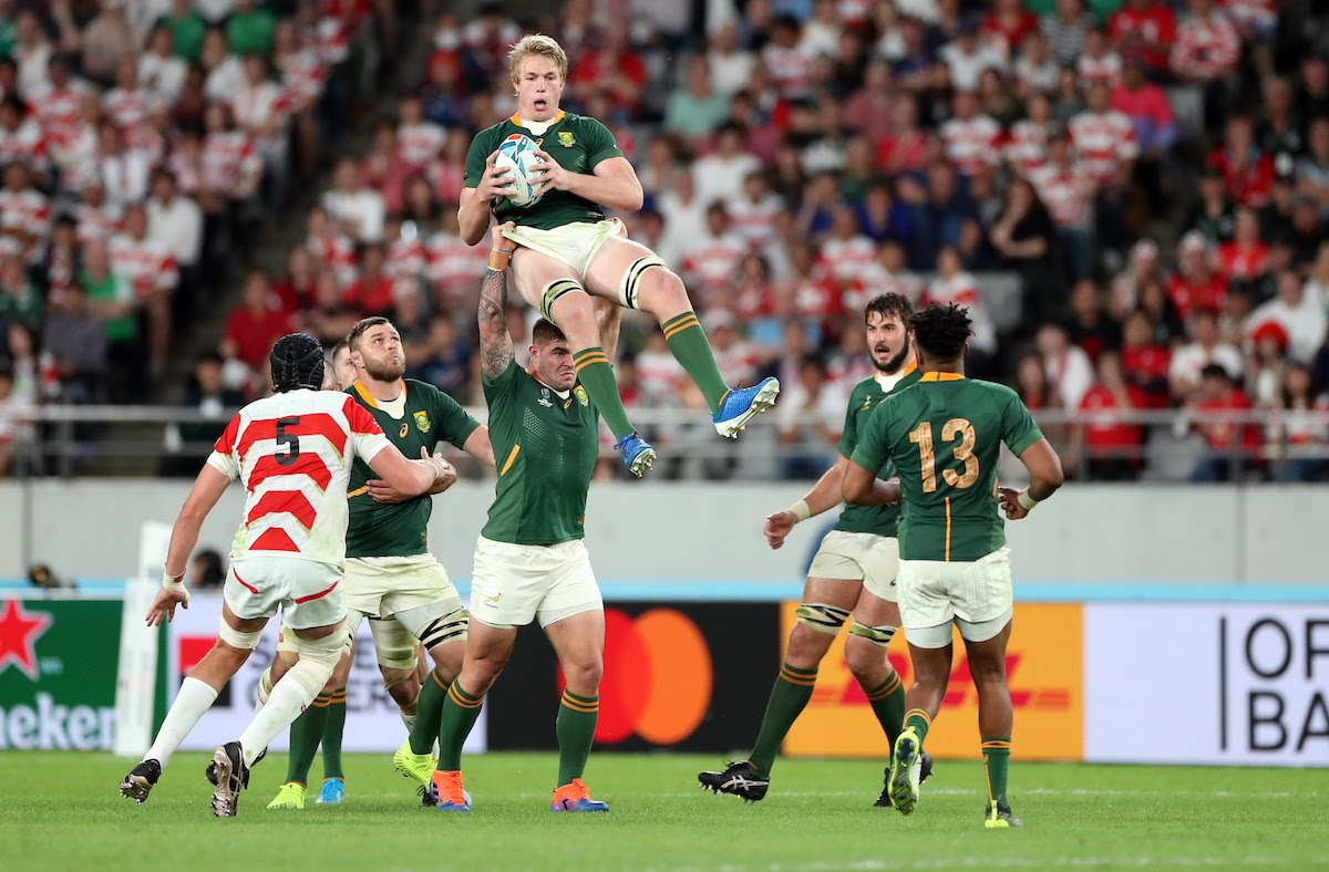Malcolm Marx of South Africa holds up Pieter-Steph Du Toit of South Africa during the Japan and South Africa Springbok Quarter-Final at the