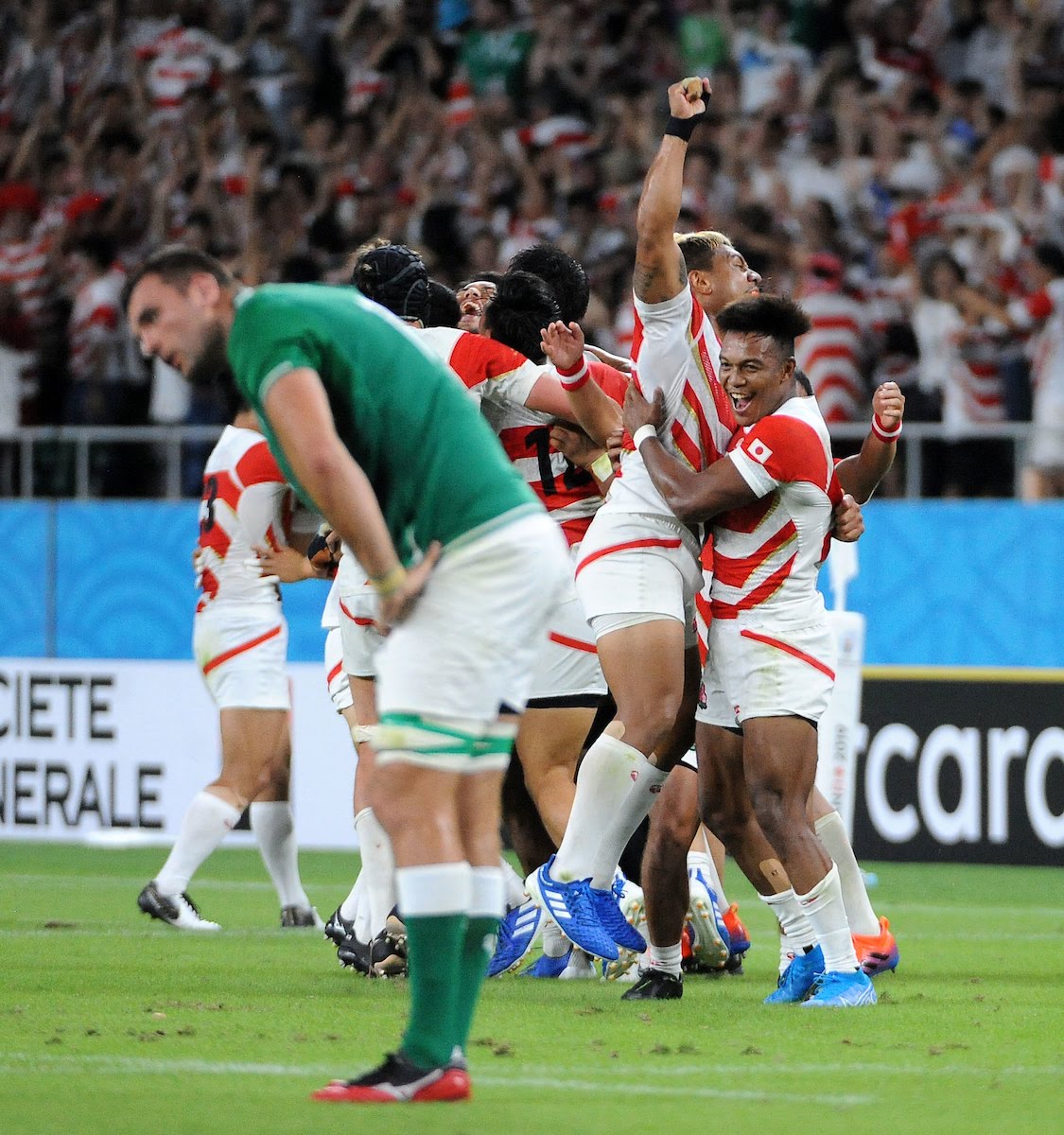 Japan celebrate scoring a try against Ireland in the 2019 Rugby World Cup 