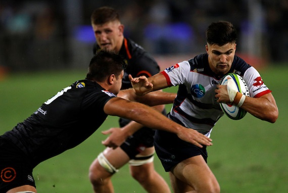 Jack Maddocks of the Rebels takes the ball into contact against the Cell C Sharks