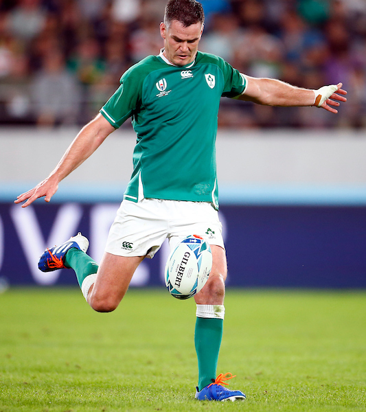 Johnny Sexton of Ireland kicks out of hand against New Zealand in their 2019 RWC quarter-final