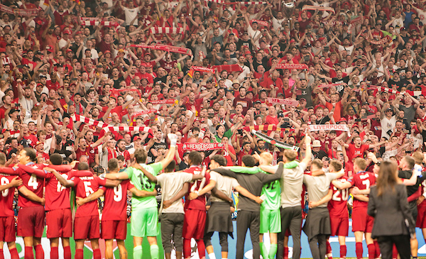 Liverpool celebrate in front of kop