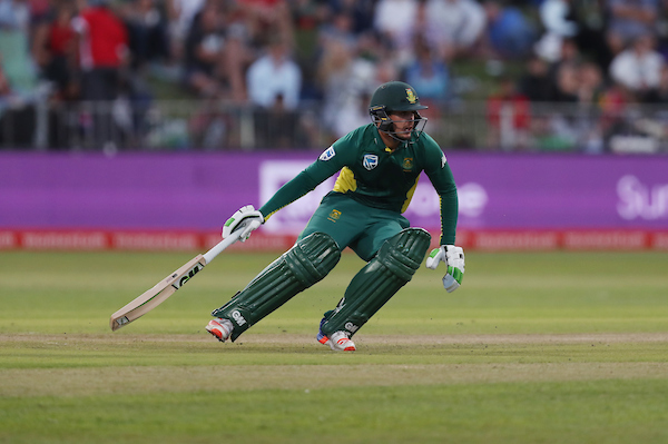 Quinton de Kock of South Africa turns for a run