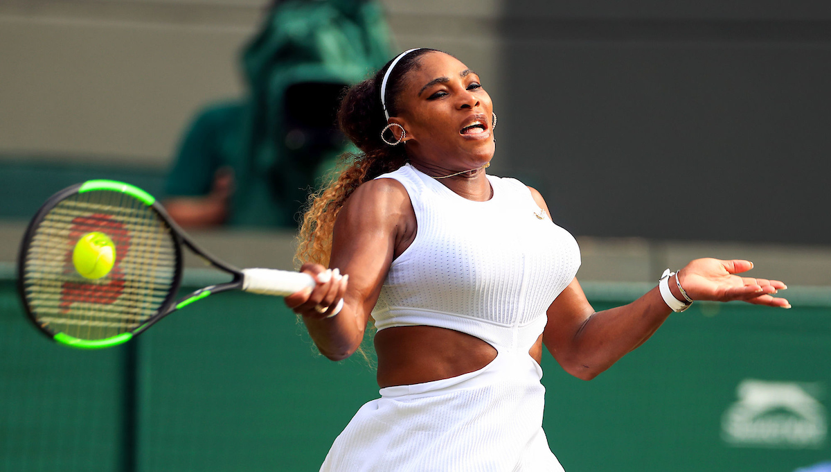 Serena Williams hits a tennis ball