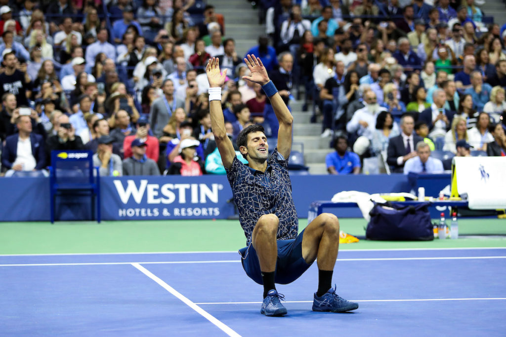 Novak Djokovic celebrates winning the US Open