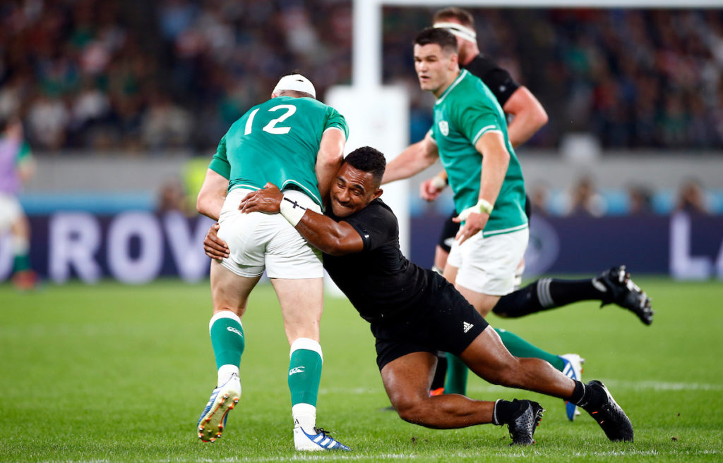 Sevu Reece of the All Blacks tackles Robbie Henshaw of Ireland