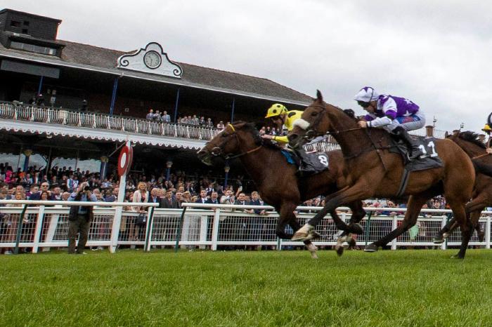 Aimeric ridden by jockey Jack Mitchell (left) wins the Jordan Electrics Ltd Handicap during the Virgin Bet Ayr Gold Cup day at Ayr Racecourse, Ayr. Picture date: Saturday September 17, 2022.