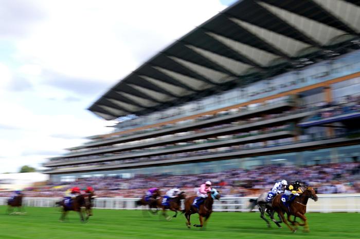 Call Me Ginger ridden by jockey Amie Waugh (right) on their way to winning the Garrard Handicap during the QIPCO King George Meeting at Ascot Racecourse. Picture date: Saturday July 23, 2022.