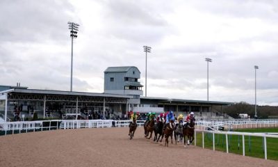 Runners and riders head around the bend during the first lap of the Betway Handicap (Div I) at Southwell Racecourse. Picture date: Thursday February 3, 2022.