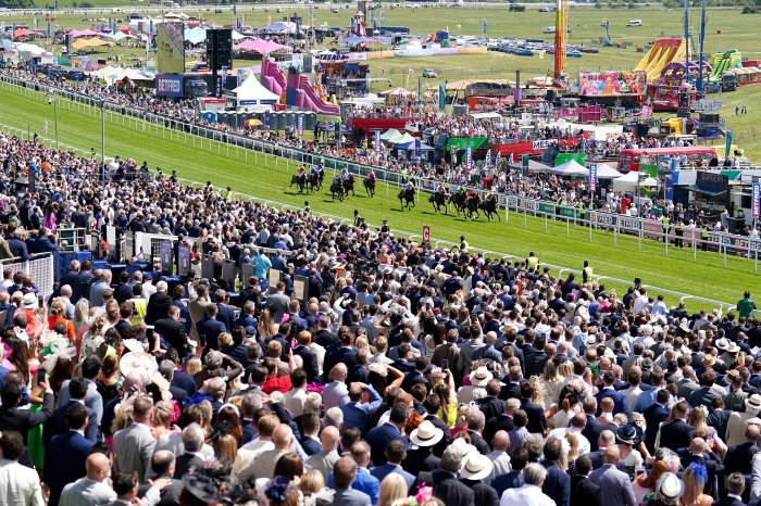 Runners and riders in action during The British EBF 40th Anniversary Woodcote Stakes during ladies day of the 2023 Derby Festival at Epsom Downs Racecourse, Epsom. Picture date: Friday June 2, 2023.