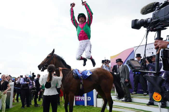 Jockey Frankie Dettori performs a flying dismount from Prosperous Voyage after winning The Princess Elizabeth Stakes during Derby Day of the 2023 Derby Festival at Epsom Downs Racecourse, Epsom. Picture date: Saturday June 3, 2023.