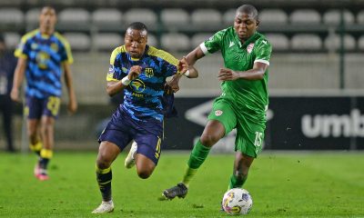 Tshegofatso Nyama of Cape Town City is challenged by Siphesihle Mkhize of Sekhukhune United