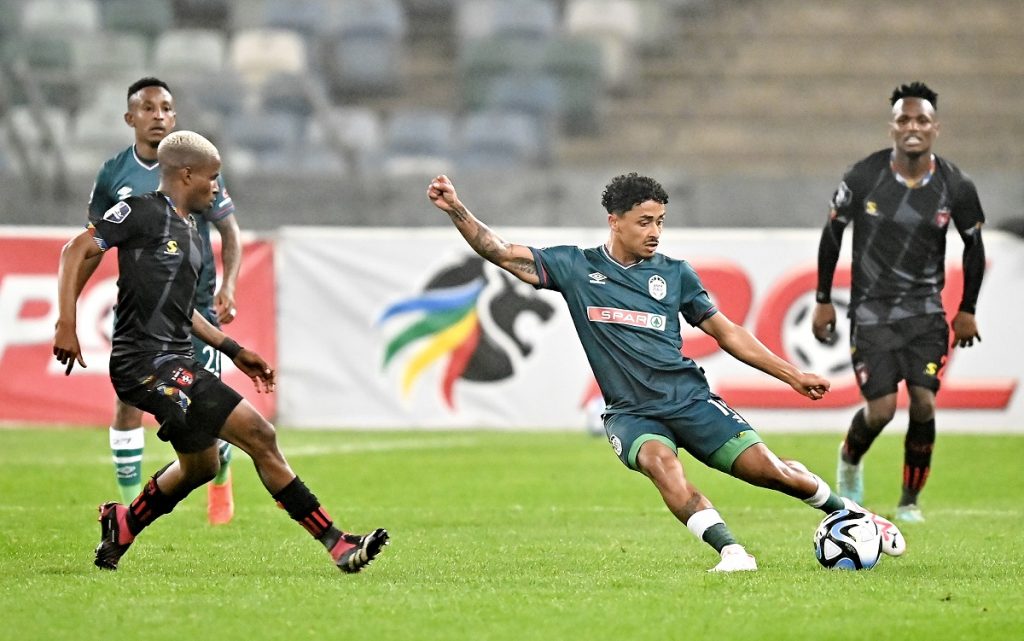 Lehlohonolo Mojela of TS Galaxy challenges Ethan Brooks of AmaZulu FC