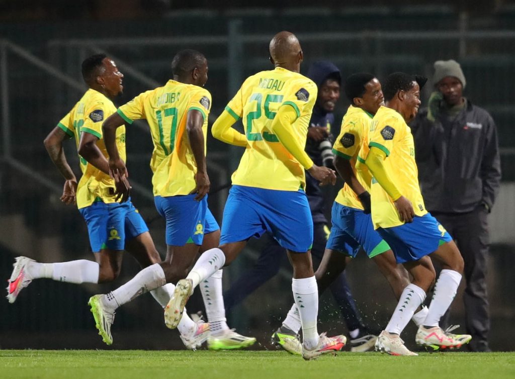 Siyabonga Mabena of Mamelodi Sundowns celebrates goal with teammates
