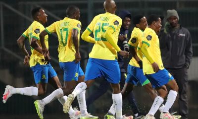 Siyabonga Mabena of Mamelodi Sundowns celebrates goal with teammates