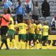 Lyle Foster of South Africa celebrates goal with teammates