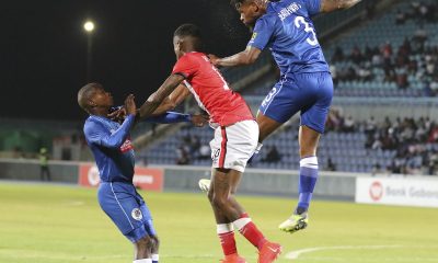 Thulani Hlatshwayo of Supersport United wins header against Tshepo Maikano of Gaborone United