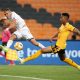 Sedwyn George of Royal AM challenged by Given Msimango of Kaizer Chiefs