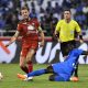 Al Hilal player Kalidou Koulibaly (R) tackles on Al Ittifaq player Jordan Henderson