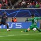Manchester City's Jeremy Doku (L) scores 1-3 against Leipzig's goalkeeper Janis Blaswich