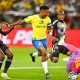 Close call for Tebogo Tlolane of Orlando Pirates as Themba Zwane, Captain of Mamelodi Sundowns nearly gets past his defence and that of Deon Hotto of Orlando Pirates