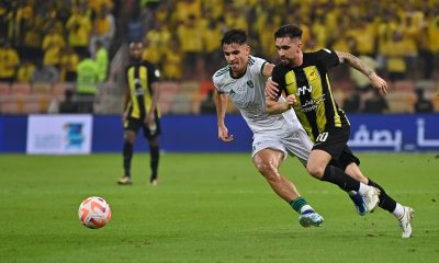 Al-Ittihad player Igor Coronado (R) in action against Al-Ahli player Gabri Veiga