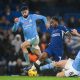 Chelsea's Raheem Sterling (C) in action against Manchester City's Mateo Kovacic (R)