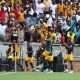 Kaizer Chiefs celebrating scoring a goal.