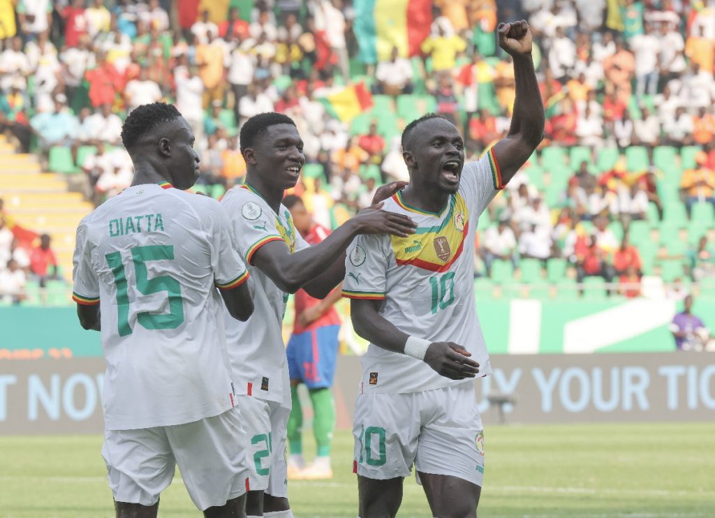 Lamine Camara of Senegal celebrates goal with Sadio Mane