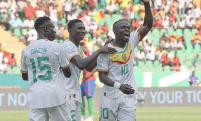 Lamine Camara of Senegal celebrates goal with Sadio Mane