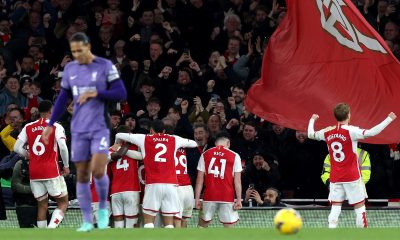 Arsenal celebrate after scoring their third goal during the English Premier League match between Arsenal and Liverpool.