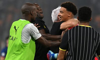 Ronwen Williams of South Africa celebrates with Hugo Broos, head coach of South Africa during the 2023 Africa Cup of Nations quarterfinal match between Cape Verde and South Africa at Charles Konan Stadium