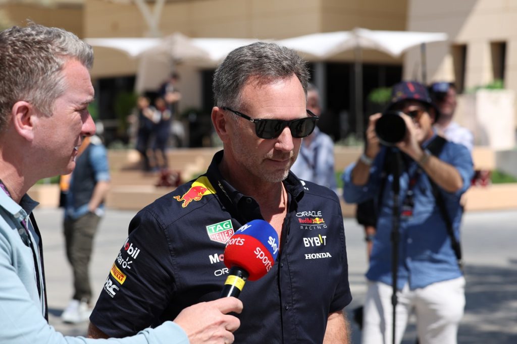 Red Bull Racing team principal Christian Horner (C) talks to media ahead of the practice sessions for the Formula One Bahrain Grand Prix, at the Bahrain International Circuit