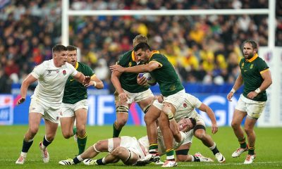 South Africa's Damian de Allende tackled by England's Tom Curry during the Rugby World Cup 2023 semi final match at the Stade de France, Saint-Denis.