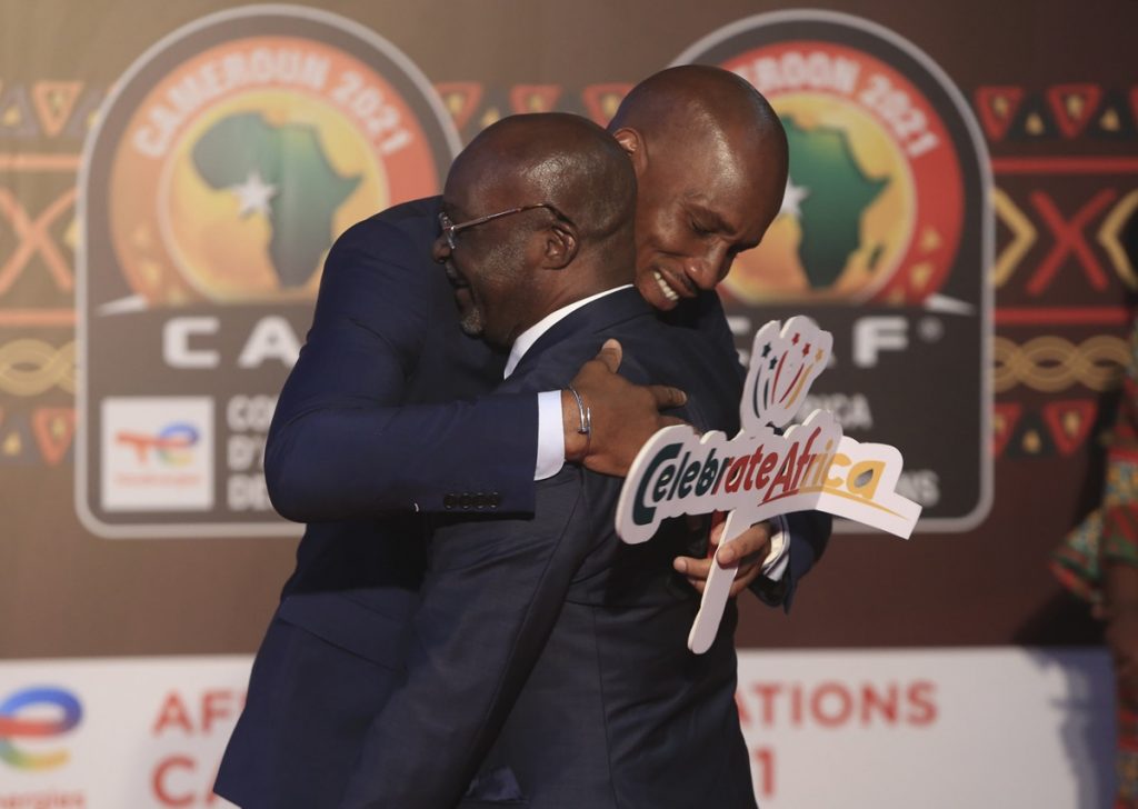 Didier Drogba and Roger Milla at the 2021 Africa Cup of Nations (Afcon)
