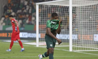 Kelechi Iheanacho of Nigeria celebrates victory after scoring the decisive penalty during the 2023 Africa Cup of Nations semifinal between Nigeria and South Africa at Peace Stadium.