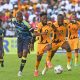 Mduduzi Mdantsane of Kaizer Chiefs is challenged by Thamsanqa Mkhize of Cape Town City during the DStv Premiership 2023/24 game between Cape Town City and Kaizer Chiefs at Athlone Stadium.
