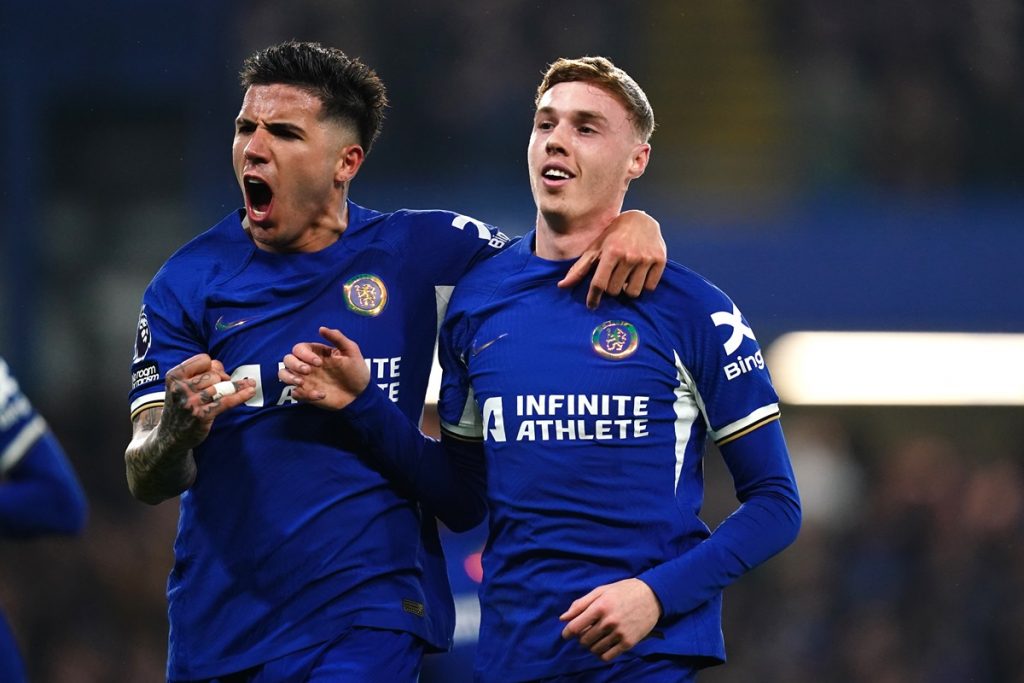 Chelsea's Cole Palmer (right) celebrates scoring their side's second goal of the game with team-mate Enzo Fernandez during the Premier League match at Stamford Bridge.