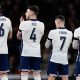 Players of England line up as they wear the new England kit that features a redesign of the St George's Cross during the friendly international soccer match between England and Brazil at Wembley Stadium.