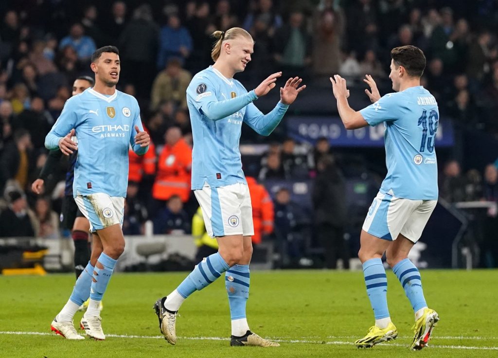 Manchester City's Erling Haaland (centre) celebrates scoring their side's third goal of the game during the UEFA Champions League round of 16, second leg match at the Etihad Stadium.