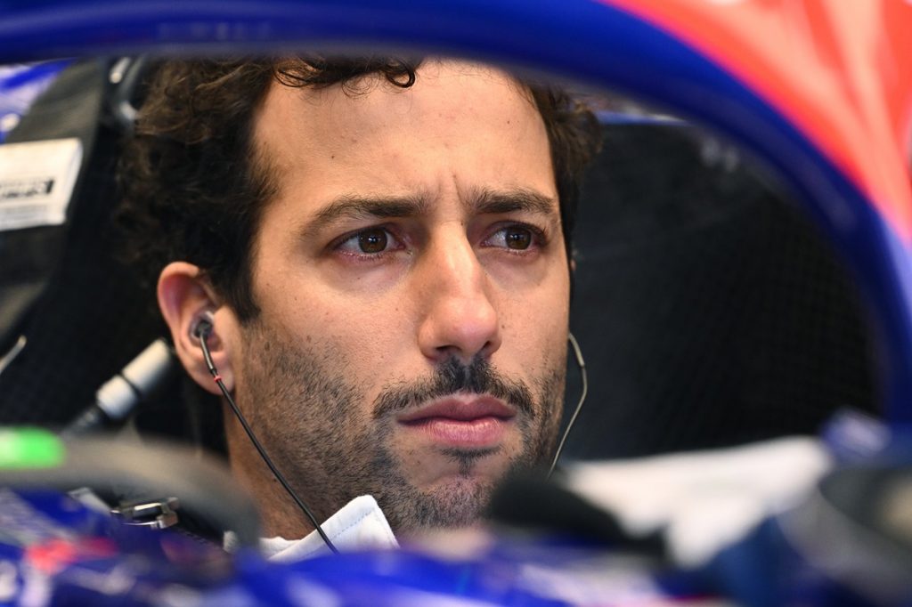 Australian driver Daniel Ricciardo of RB looks on in the pits during Free Practice Two at the Albert Park Grand Prix Circuit in Melbourne, Australia.