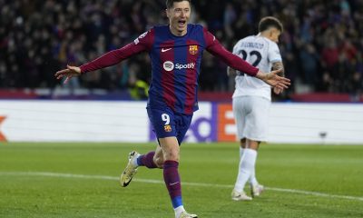 FC Barcelona's Robert Lewandowski celebrates after scoring the 3-1 goal during the UEFA Champions League round of 16 second leg soccer match between FC Barcelona and SSC Napoli, in Barcelona