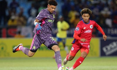 Ronwen Williams of Mamelodi Sundowns challenged by Shandre Campbell of Supersport United during the DStv Premiership 2023/24 match between Mamelodi Sundowns and Supersport United at the Loftus Stadium