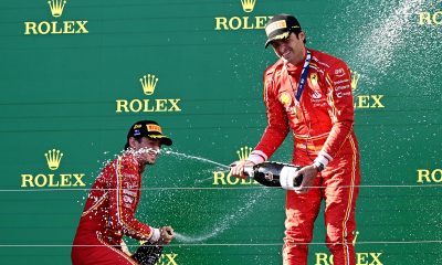 Ferrari's Charles Leclerc of Monaco (L) and Carlos Sainz of Spain celebrate second and first place respectively following the Australian Grand Prix 2024 at Albert Park Circuit in Melbourne.