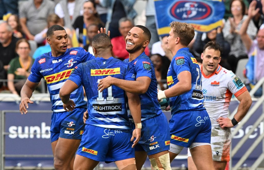 Suleiman Hartzenberg of the Stormers celebrates with tryscorer Leolin Zas during the United Rugby Championship 2023/24 game between the Stormers and Edinburgh at Cape Town Stadium.