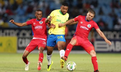 Sipho Mbule of Mamelodi Sundowns challenged by Grant Margeman and Gape Moral of SuperSport United during the DStv Premiership 2023/24 match between Mamelodi Sundowns and Supersport United at the Loftus Stadium.