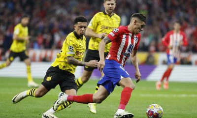 Atletico's Nahuel Molina (R) in action during the UEFA Champions League quarter-final, 1st leg soccer match between Atletico Madrid and Borussia Dortmund, in Madrid, Spain, 10 April 2024