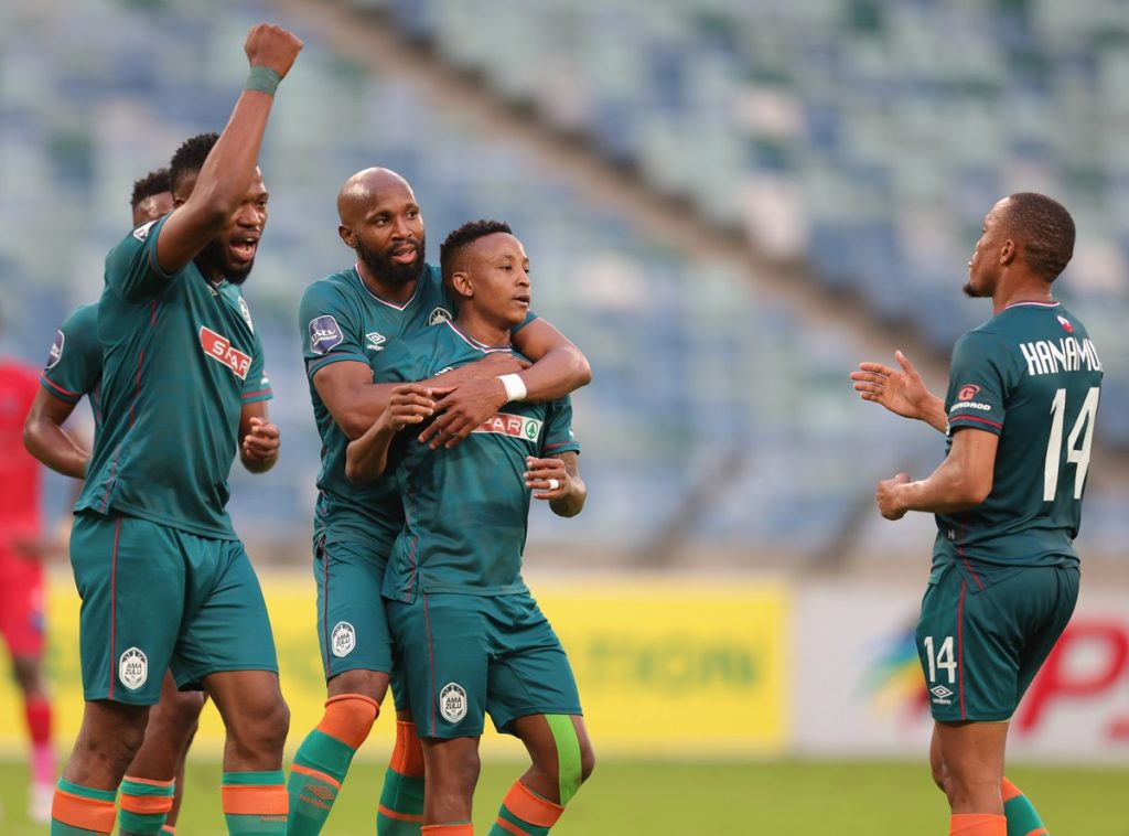 Hendrick Ekstein of AmaZulu FC celebrates scoring winning penalty with teammates during the DStv Premiership 2023/24 match between AmaZulu and Chippa United at Moses Mabhida Stadium.